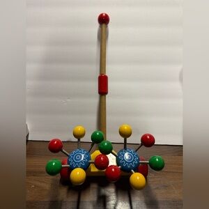 Very Rare vintage Kouvalias Vibrant Wooden Toy with Red, Yellow, Green, and Blue